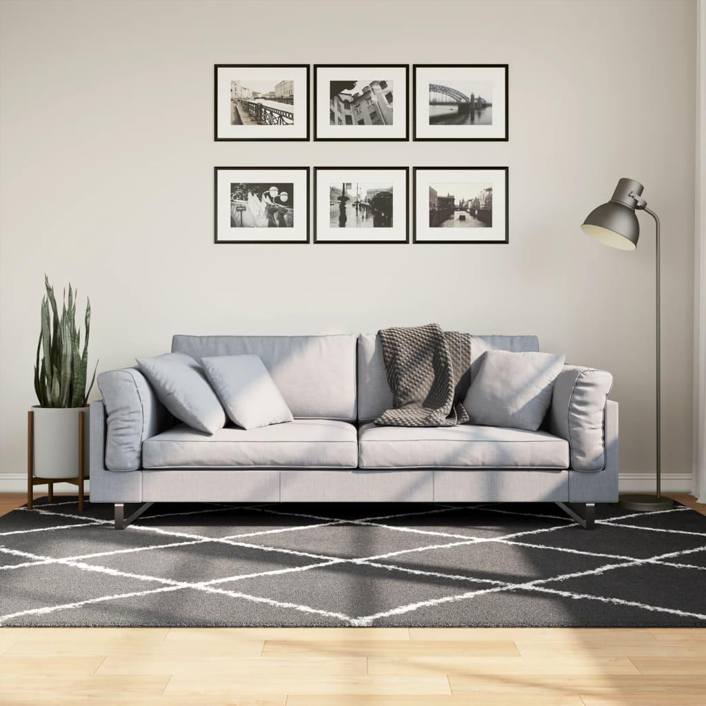 Shaggy gulvtæppe 160x230 cm høj luv sort og cremefarvet